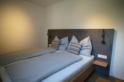 Ein Bett oder Betten in einem Zimmer der Unterkunft Alpenchalet zurHinterochsenweide SKI IN & SKI OUT