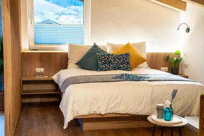 Ein Bett oder Betten in einem Zimmer der Unterkunft Haus Gschösser