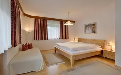 Ein Bett oder Betten in einem Zimmer der Unterkunft Apartment Alpin