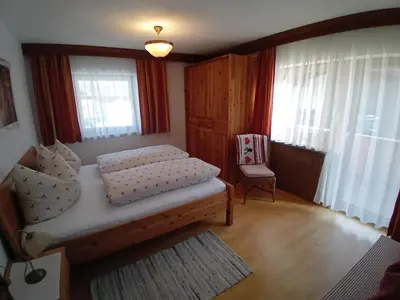 Ein Bett oder Betten in einem Zimmer der Unterkunft Apartment Alpin