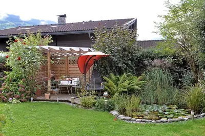 Ein Garten an der Unterkunft Apartment Alpin