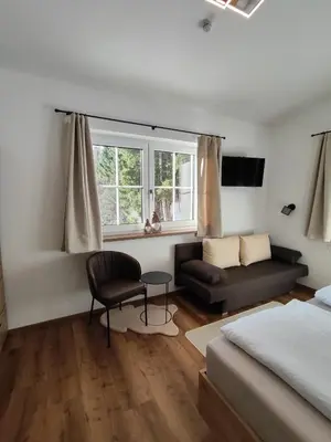 Ein Bett oder Betten in einem Zimmer der Unterkunft Apart Anna & Anton