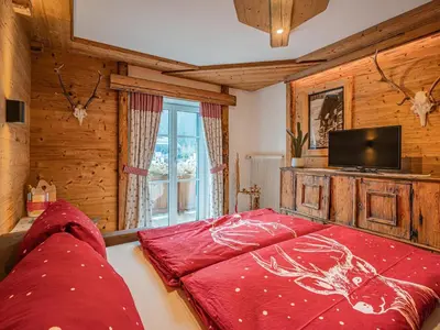 Ein Bett oder Betten in einem Zimmer der Unterkunft Hilde XL