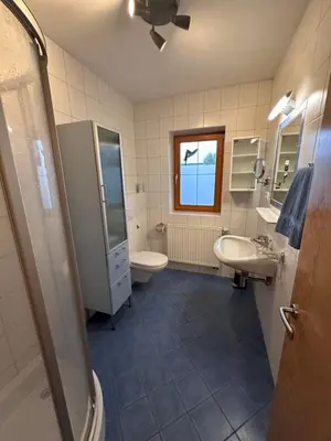 Ein Badezimmer in der Unterkunft Mesnerhof
