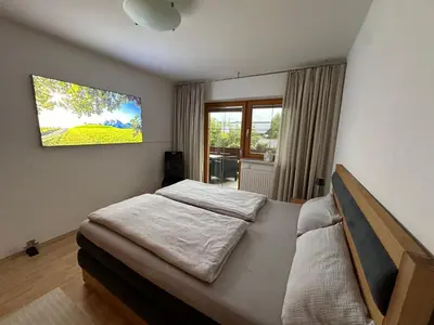 Ein Bett oder Betten in einem Zimmer der Unterkunft Mesnerhof