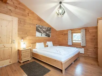 Ein Bett oder Betten in einem Zimmer der Unterkunft Windau