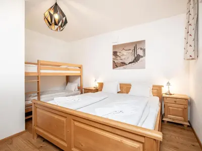 Ein Bett oder Betten in einem Zimmer der Unterkunft Windau