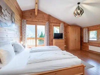 Ein Bett oder Betten in einem Zimmer der Unterkunft Windau