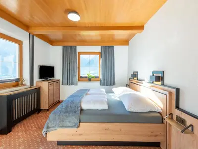 Ein Bett oder Betten in einem Zimmer der Unterkunft Apartment Mayrhofen near Horbergbahn