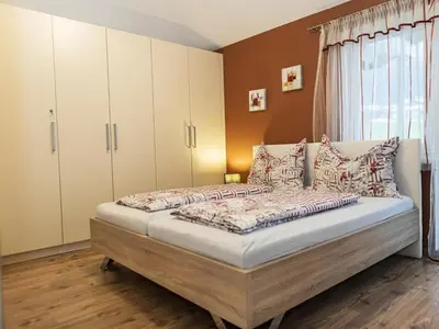 Ein Bett oder Betten in einem Zimmer der Unterkunft Ferienhaus Gartentraum 1