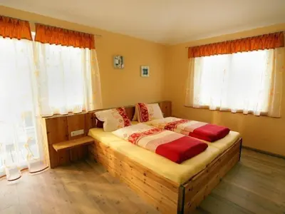 Ein Bett oder Betten in einem Zimmer der Unterkunft Ferienhaus Gartentraum
