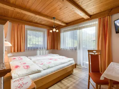 Ein Bett oder Betten in einem Zimmer der Unterkunft Gästehaus Geisler