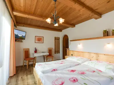 Ein Bett oder Betten in einem Zimmer der Unterkunft Gästehaus Geisler