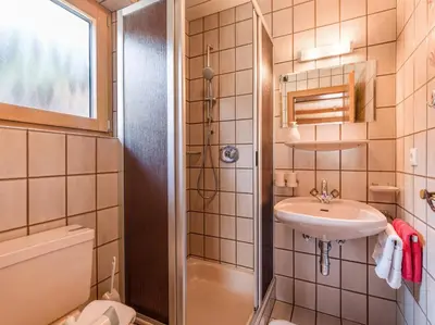 Ein Badezimmer in der Unterkunft Gästehaus Geisler