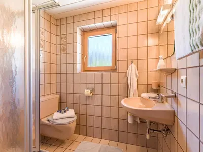 Ein Badezimmer in der Unterkunft Gästehaus Geisler