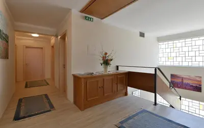 Ein Bett oder Betten in einem Zimmer der Unterkunft Pension Schenkenfelder