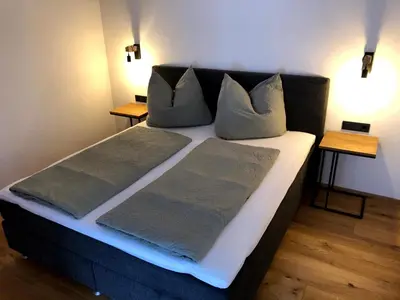 Ein Bett oder Betten in einem Zimmer der Unterkunft BERGGLÜCK