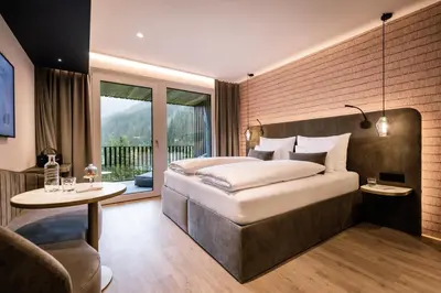 Ein Bett oder Betten in einem Zimmer der Unterkunft Goldstück - Adults Only