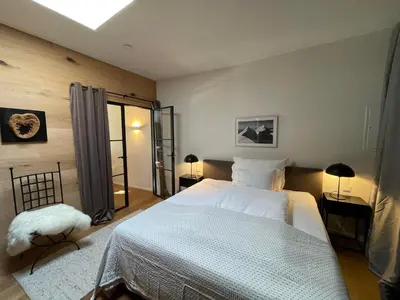 Ein Bett oder Betten in einem Zimmer der Unterkunft Winklern Lodges