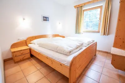 Ein Bett oder Betten in einem Zimmer der Unterkunft Chalet Hochkrimml 141