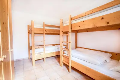 Ein Bett oder Betten in einem Zimmer der Unterkunft Chalet Hochkrimml 141