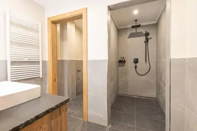 Ein Badezimmer in der Unterkunft Grubi´s Chalet Alm