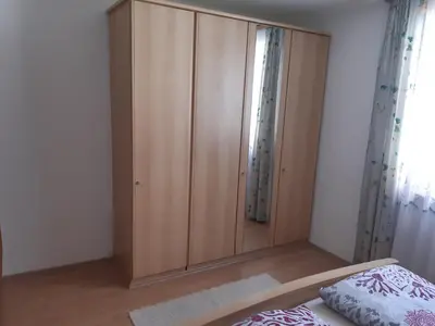 Ein Bett oder Betten in einem Zimmer der Unterkunft Ferienwohnung Haus Bergfrieden