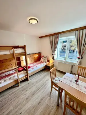 Ein Bett oder Betten in einem Zimmer der Unterkunft Central Kitz Apartments
