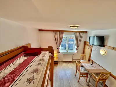 Ein Bett oder Betten in einem Zimmer der Unterkunft Central Kitz Apartments