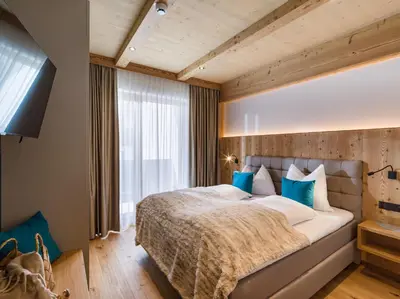 Ein Bett oder Betten in einem Zimmer der Unterkunft Das Bergjuwel