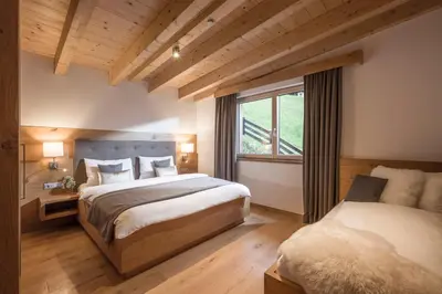 Ein Bett oder Betten in einem Zimmer der Unterkunft Das Bergjuwel