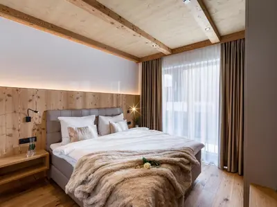 Ein Bett oder Betten in einem Zimmer der Unterkunft Das Bergjuwel