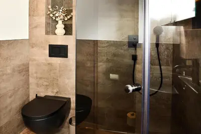 Ein Badezimmer in der Unterkunft Appartement Edelschwarz
