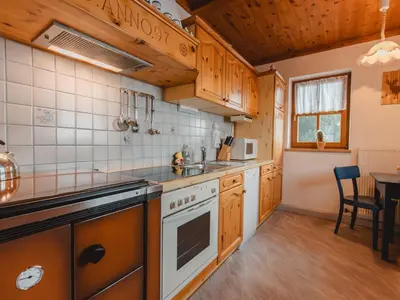 Küche/Küchenzeile in der Unterkunft Chalet Ferienhaus Taubenstein by Interhome