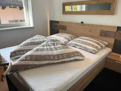 Ein Bett oder Betten in einem Zimmer der Unterkunft Ferienwohnung Victoria
