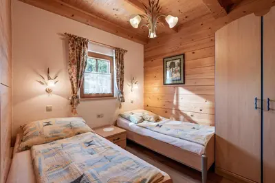 Ein Bett oder Betten in einem Zimmer der Unterkunft Ferienwohnungen Mitterer