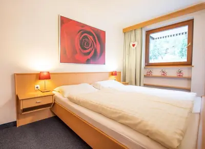 Ein Bett oder Betten in einem Zimmer der Unterkunft Ferienwohnung Königsleiten 25 - Top 44