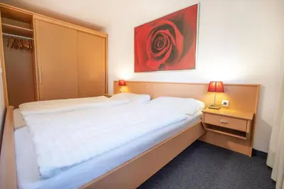 Ein Bett oder Betten in einem Zimmer der Unterkunft Ferienwohnung Königsleiten 25 - Top 44