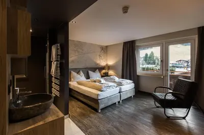 Ein Bett oder Betten in einem Zimmer der Unterkunft THOMSN Central Hotel & Appartements