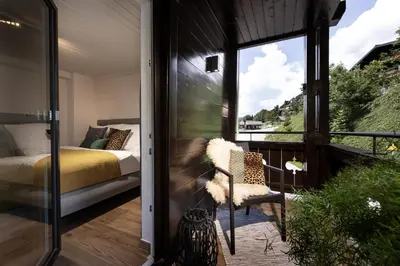Ein Bett oder Betten in einem Zimmer der Unterkunft Boutique-Ferienwohnungen Unterschwartengut inklusive Nationalpark Hohe Tauern Card