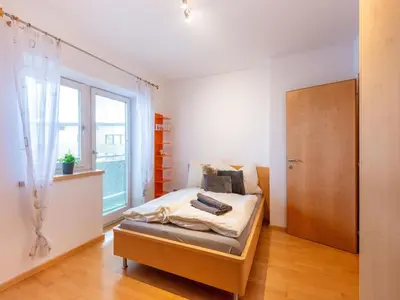 Ein Bett oder Betten in einem Zimmer der Unterkunft Apartment in Niedernsill near Ski Slopes