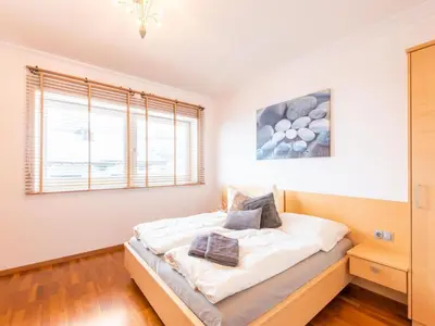 Ein Bett oder Betten in einem Zimmer der Unterkunft Apartment in Niedernsill near Ski Slopes