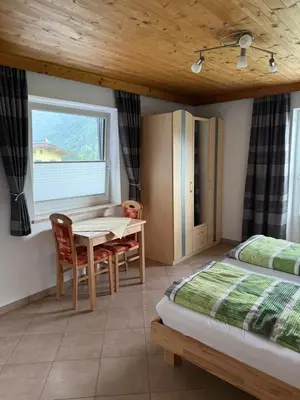 Ein Bett oder Betten in einem Zimmer der Unterkunft Ferienwohnung Astl