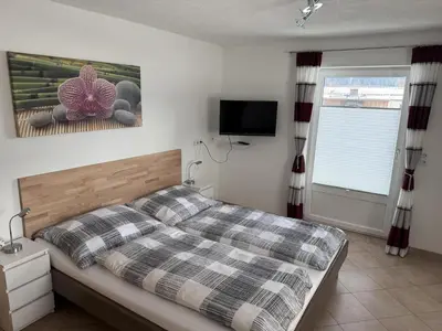 Ein Bett oder Betten in einem Zimmer der Unterkunft Ferienwohnung Astl