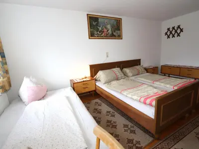 Ein Bett oder Betten in einem Zimmer der Unterkunft Fiechterhof