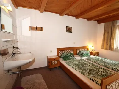 Ein Bett oder Betten in einem Zimmer der Unterkunft Fiechterhof