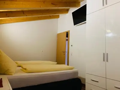 Ein Bett oder Betten in einem Zimmer der Unterkunft Appartement inkl Gästekarte
