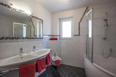 Ein Badezimmer in der Unterkunft Appart Ambiente