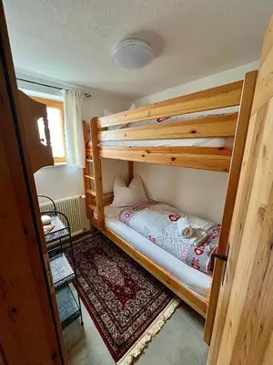 Ein Bett oder Betten in einem Zimmer der Unterkunft Chalet Panoramablick