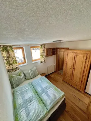 Ein Bett oder Betten in einem Zimmer der Unterkunft Chalet Panoramablick